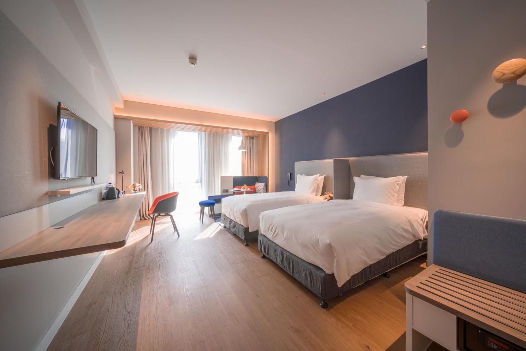 Holiday Inn Express Shanghai Huijin By Ihg Экстерьер фото